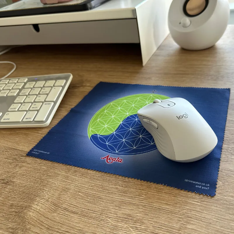 Mauspad aus Stoff mit Blume des Lebens in grün-blauem Design