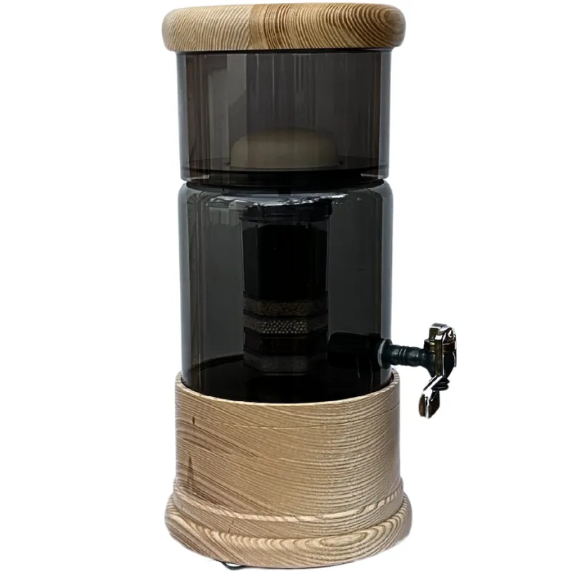 AcalaQuell Mini Wasserfilter in Antrazit mit antrazitfarbenem oberen Tank, Glastank sowie rundem Deckel und Sockel aus Esche-Echtholz.